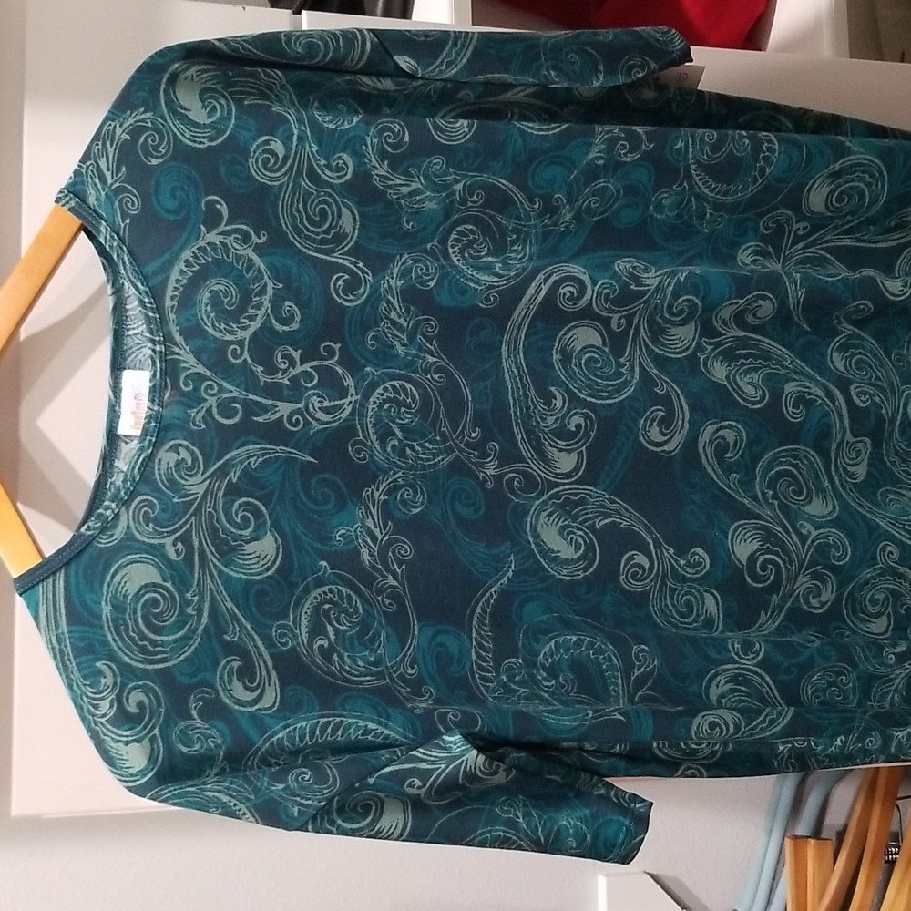 Lularoe Irma Top. Brand new with tags. Multicolored and paisley print
